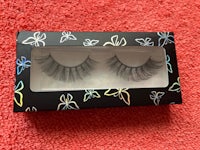 a pair of false eyelashes in a box